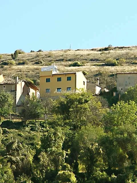 Alojamiento turístico POSADA DEL VIENTO - APTO N킺 1 (PLANTA BAJA-CON TERRAZA) en BALCONETE · GUADALAJARA
